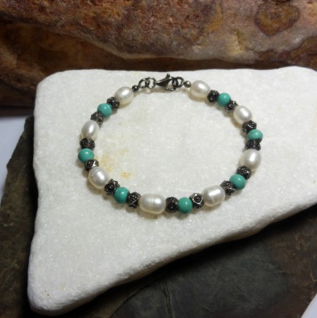 no.bil.0398-0305 Turkuaz ve İncili 925 ay. Gümüş bileklik. KDV dahil 210,00 TL